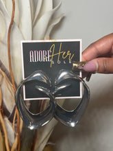 Load image into Gallery viewer, silver statement earrings
chunky silver hoops
sculptural earrings
bold hoop earrings
modern jewelry
silver fashion earrings
lightweight earrings
futuristic earrings
Adore Her Sole accessories
The Bold Edit