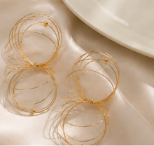 Load image into Gallery viewer, oversized gold spiral statement earrings from Adore Her Sole.