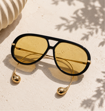 Load image into Gallery viewer, Black oversized aviator sunglasses with yellow tinted lenses from Adore Her Sole.