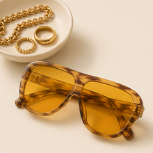 Load image into Gallery viewer, Oversized amber Too Fly sunglasses with translucent frames and yellow tinted lenses from Adore Her Sole.