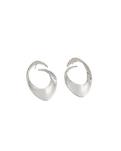 Load image into Gallery viewer, silver statement earrings
chunky silver hoops
sculptural earrings
bold hoop earrings
modern jewelry
silver fashion earrings
lightweight earrings
futuristic earrings
Adore Her Sole accessories
The Bold Edit