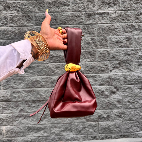 bold statement bag, knotted handbag, top handle purse, oxblood bag, faux leather purse, bold accessory, fall fashion, street style bag, Adore Her Sole bag