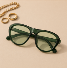 Load image into Gallery viewer, Oversized green Outside Pressure sunglasses with light green tinted lenses from Adore Her Sole.
