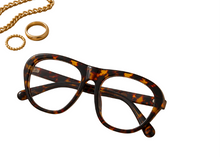 Load image into Gallery viewer, Oversized leopard print Outside Pressure sunglasses with clear lenses from Adore Her Sole.
