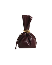 Load image into Gallery viewer, bold statement bag, knotted handbag, top handle purse, oxblood bag, faux leather purse, bold accessory, fall fashion, street style bag, Adore Her Sole bag
