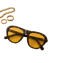 Load image into Gallery viewer, Oversized leopard print Outside Pressure sunglasses with yellow tinted lenses from Adore Her Sole.
